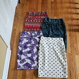 Four bodycon skirts small NWOT